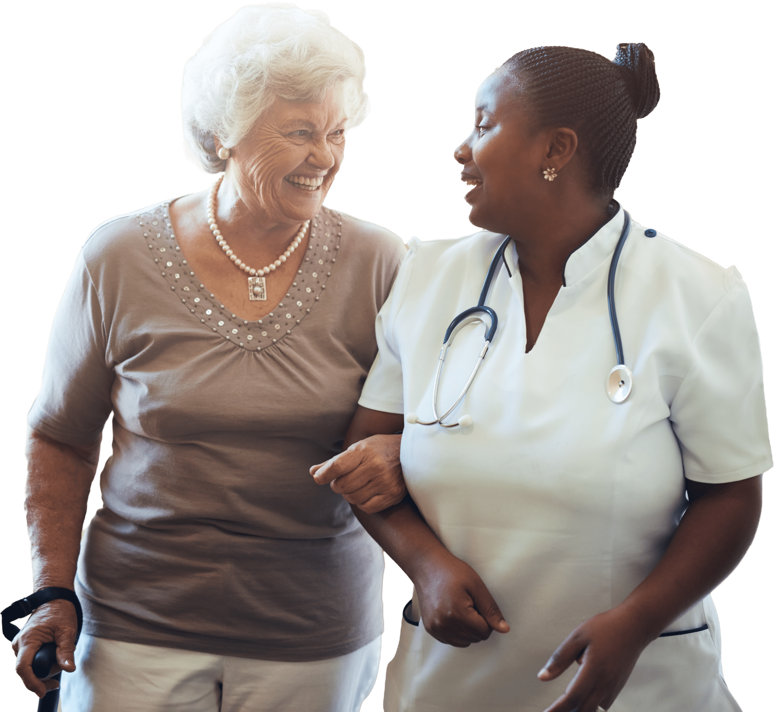 Senior woman walking in the nursing home supported by a caregiver